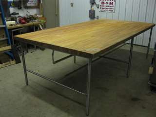  looking at a 120 x 60 wood butcher block bakery work / prep table 