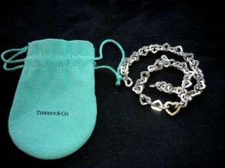 One Tiffany & Co Heart Neclace with .925 Sterling Silver and an 18k 