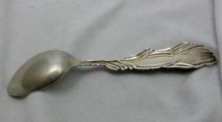 sterling silver souvenir spoon depicting a alligator on the handle 