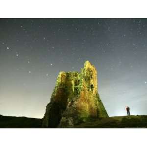 Stars in the Sky are Seen Over a Remains of Medieval Fortress Premium 