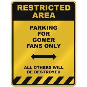  RESTRICTED AREA  PARKING FOR GOMER FANS ONLY  PARKING 