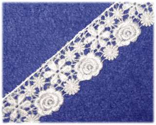   lace is 2 wide and the floral area is very stong unique and vintage