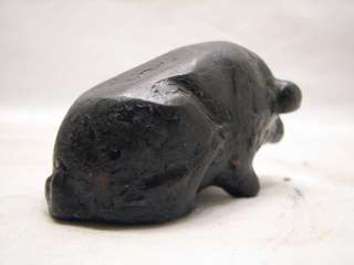  cast iron pig paper weight. Has some remaining black paint, some 