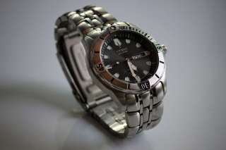   Titanium E100 S011922 Wrist Watch   Water Resistant Metal Band  