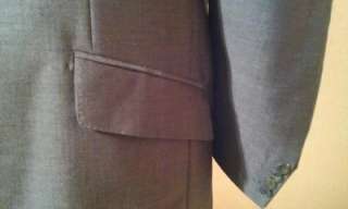   Jacket by Kilgour, No. 8 Savile Row. One Button, Peak Lapels  