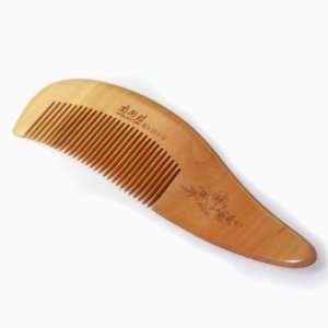 Peach Wood Comb With Smooth Finishing And Unique Decorative Design