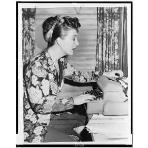 Gypsy Rose Lee, seated at typewriter 1956 