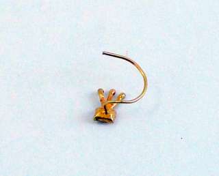 18 K SOLID GOLD NOSE STUD. SIMPLE DESIGN AND SATED SMALL ZIRCON, NICE 