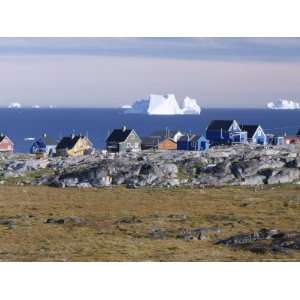  Painted Village Houses in Front of Icebergs in Disko Bay 