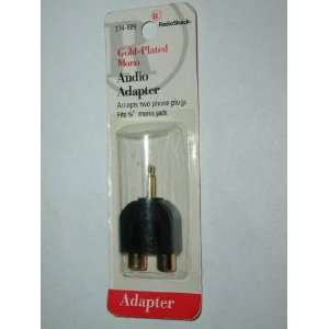   ADAPTER ACCEPTS TWO PHONE PLUGS. FITS 1/8 MONO JACK. NEW IN PACKAGE