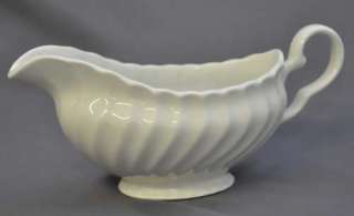   white gravy boat marked on the base made in england 3 5 8 tall 8 1 2
